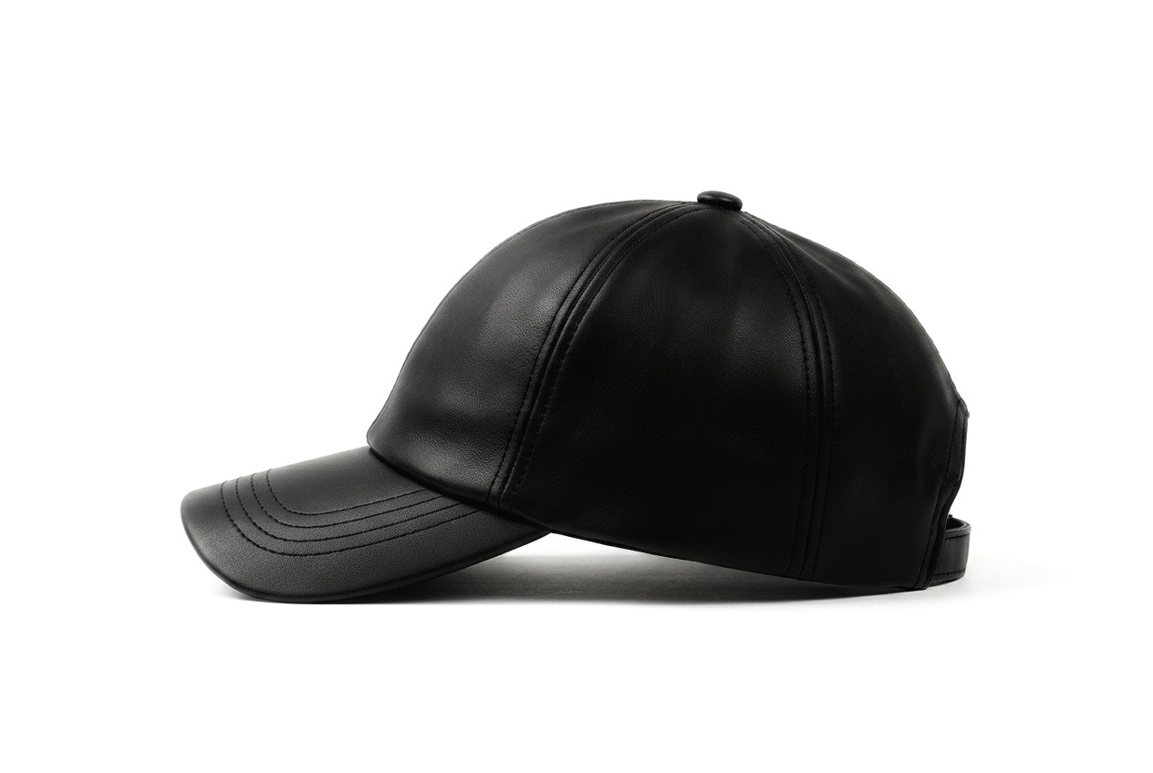 ALA G1 leather cap in full side profile showing the curved visor
