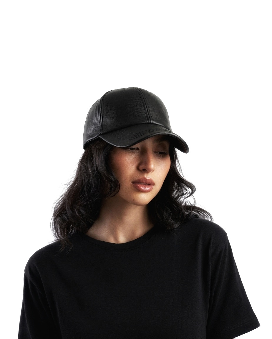 Model wearing the ALA G1 leather cap, front view